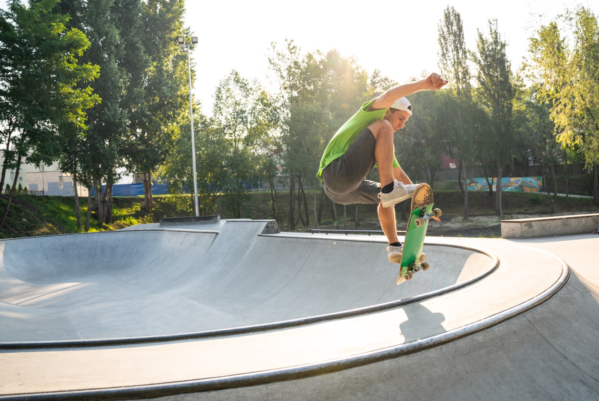 Group of professional skaters teens at the skatepark