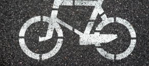 Icon of bicycle paths on asphalt