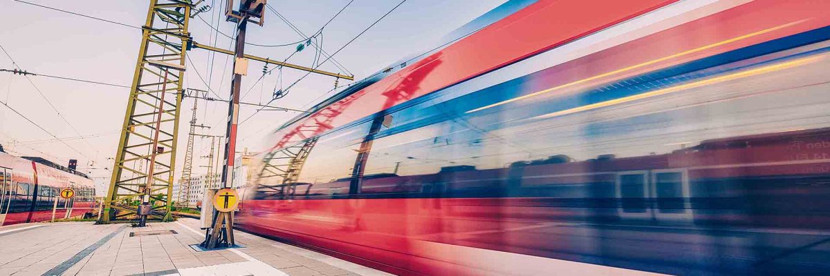 High speed train in motion on the railway station