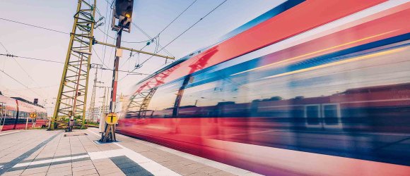 High speed train in motion on the railway station