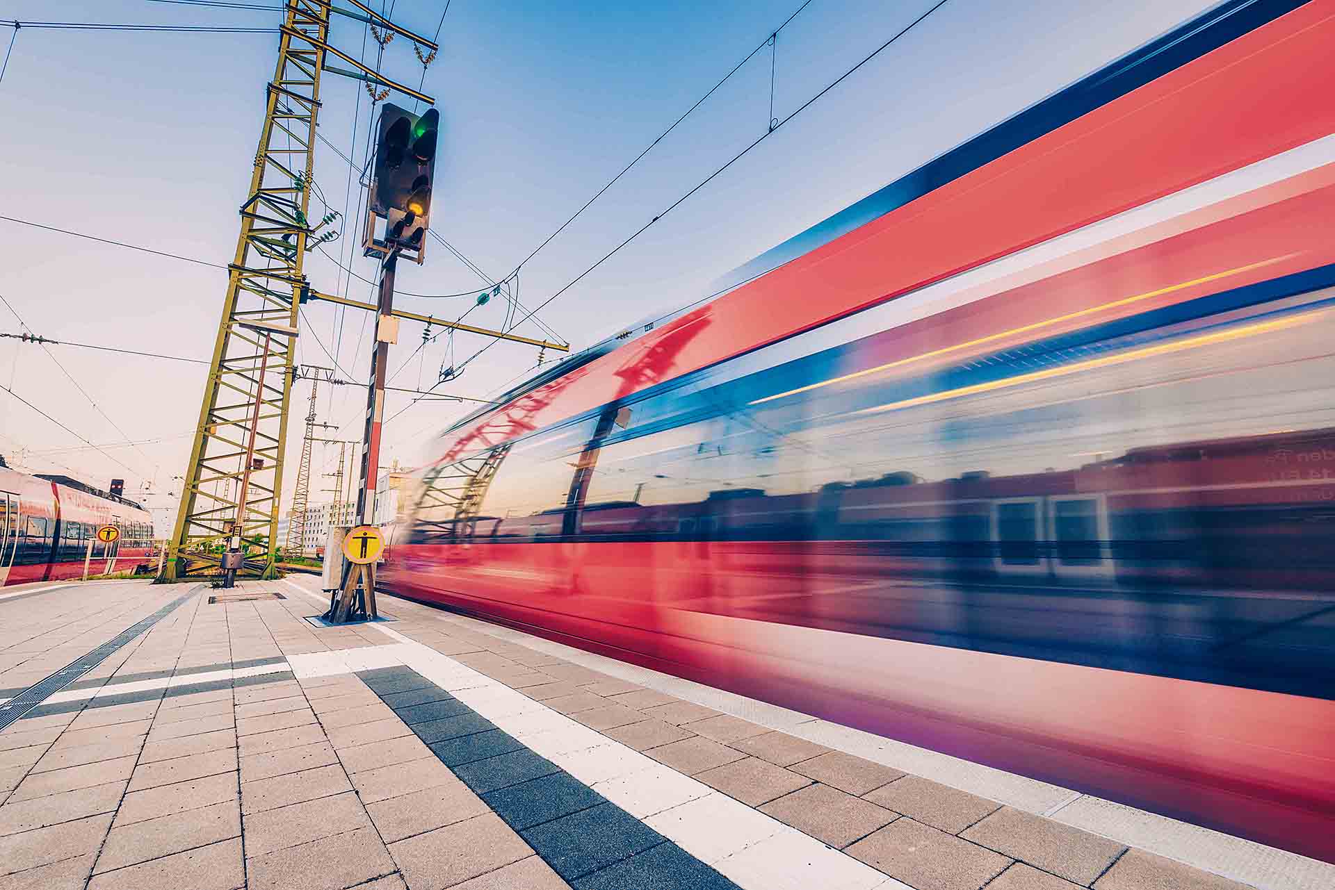 High speed train in motion on the railway station