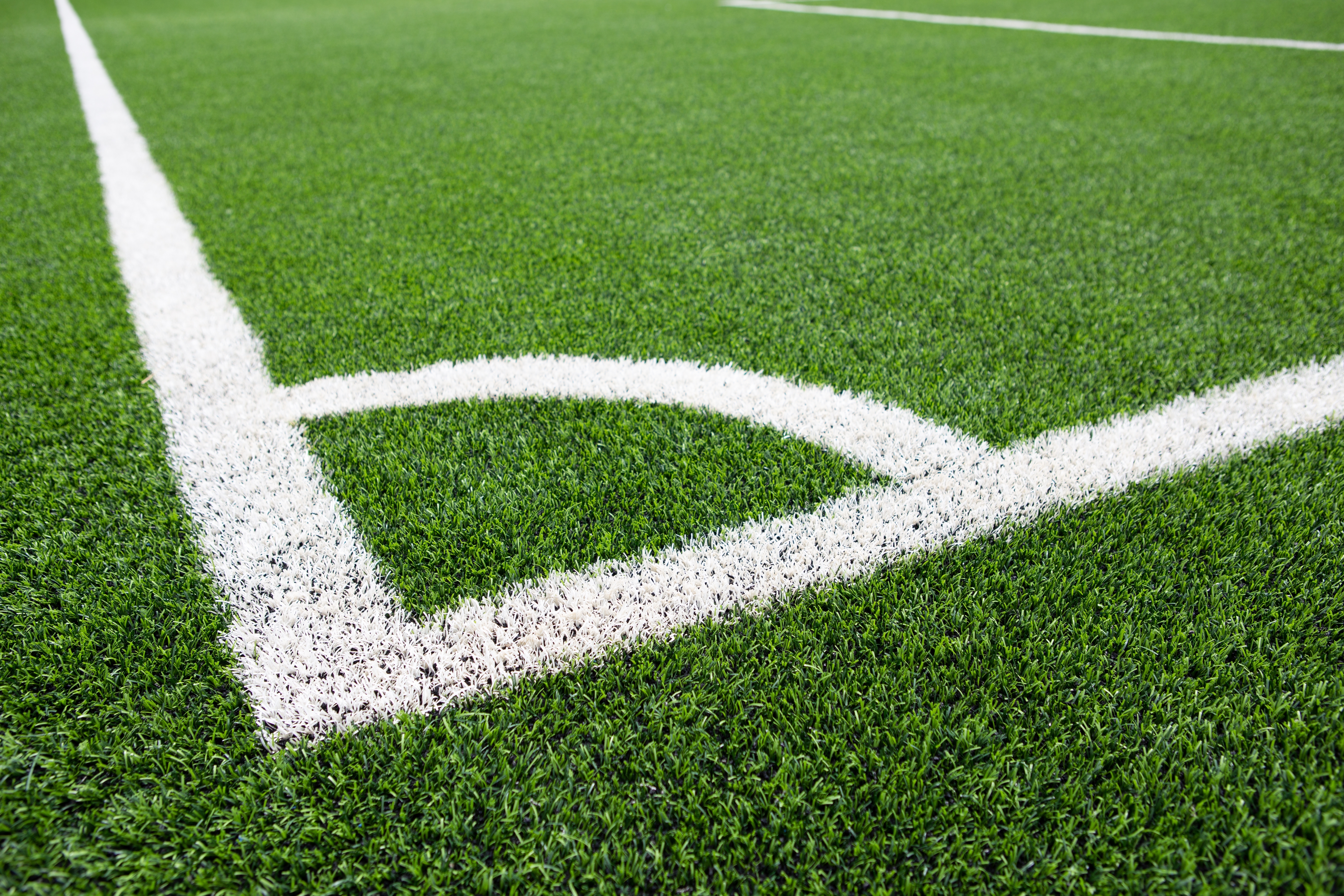 Football field corner green turf ,Corner of soccer pitch,soccer field grass conner Football field corner green turf ,Corner of soccer pitch,soccer field grass conner