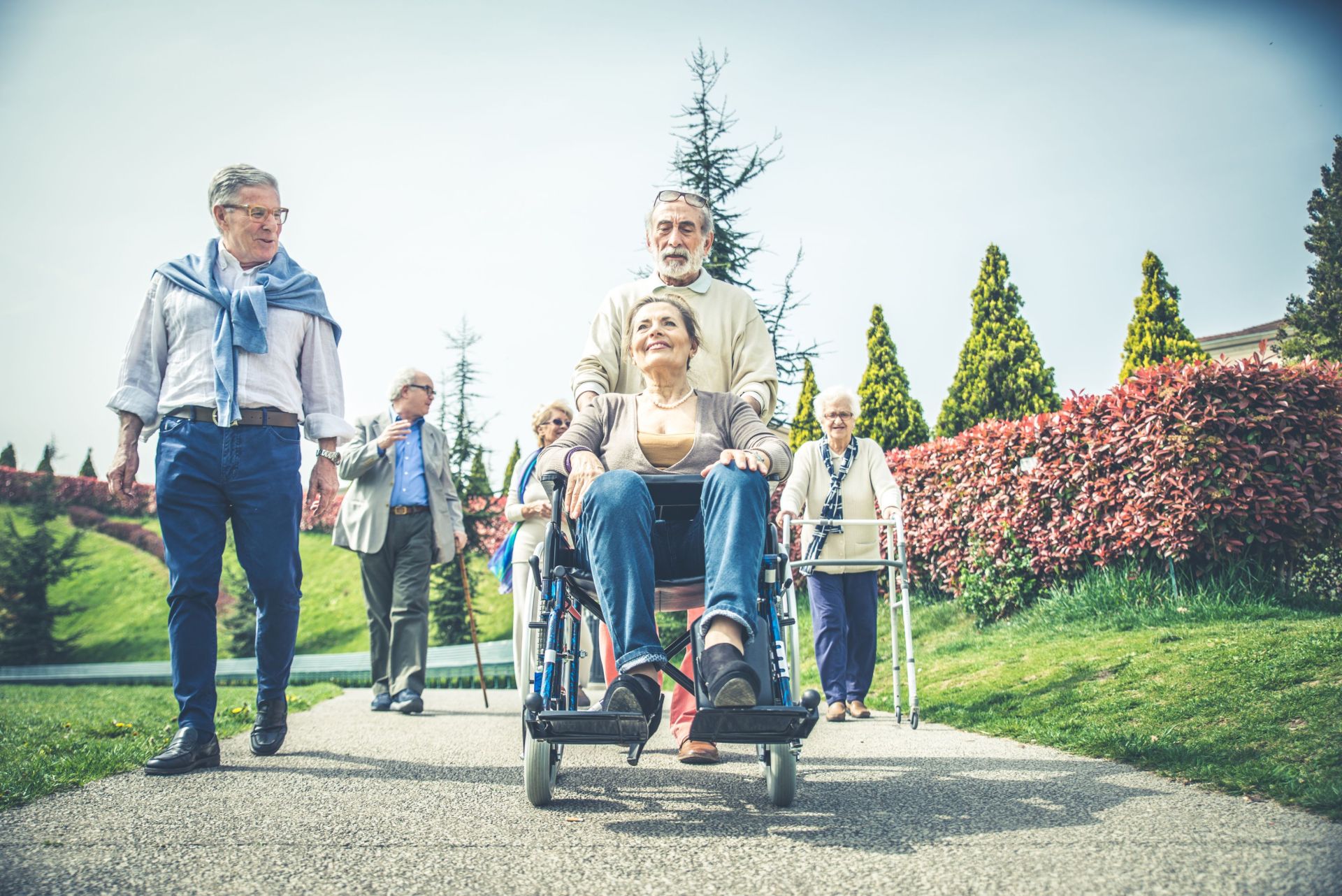 Senior people walking outdoors