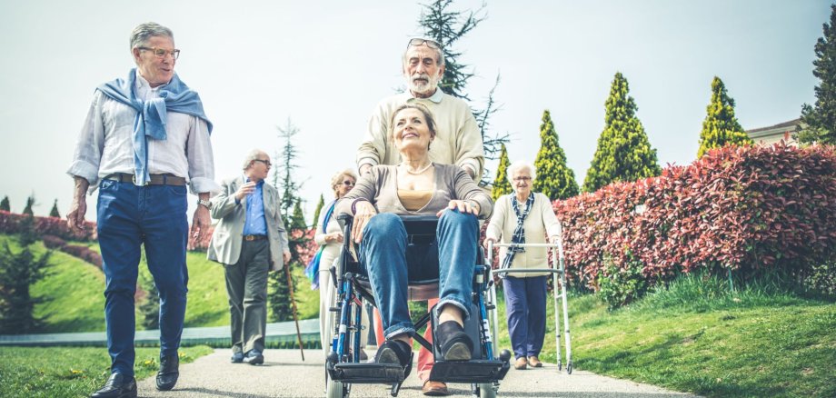Senior people walking outdoors