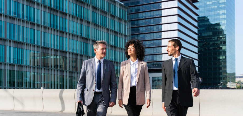 Business people meeting in a business park Business people meeting in a business park